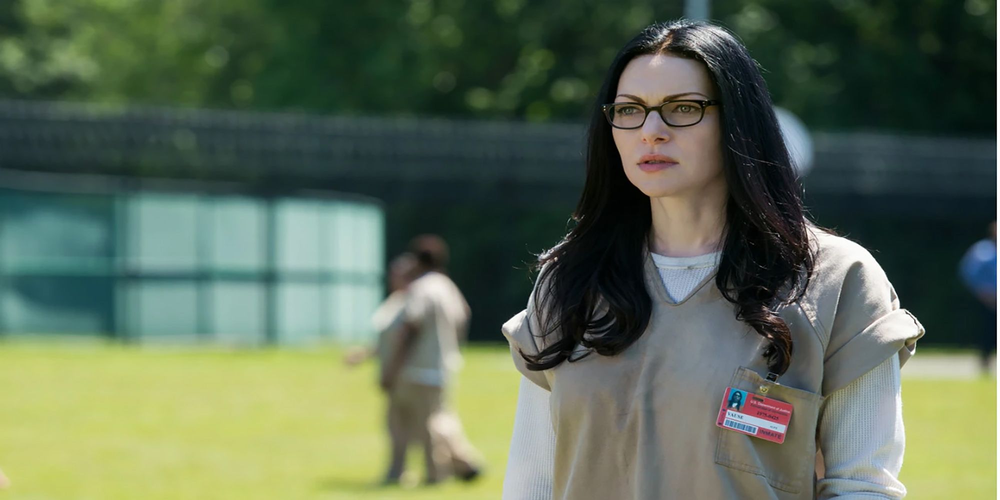 Alex Vause walks the yard in Litchfield Prison in Orange Is The New Black.