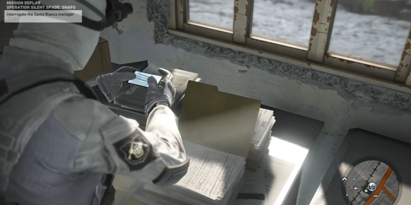 Soldier taking pictures of intel in Ghost Recon Wildlands