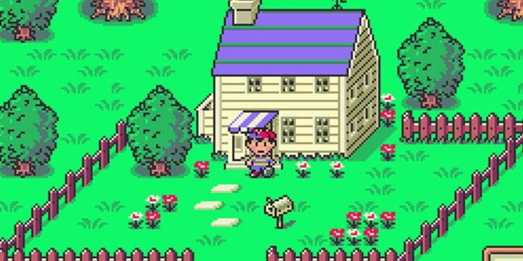 Ness stands outside of his house on a sunny day