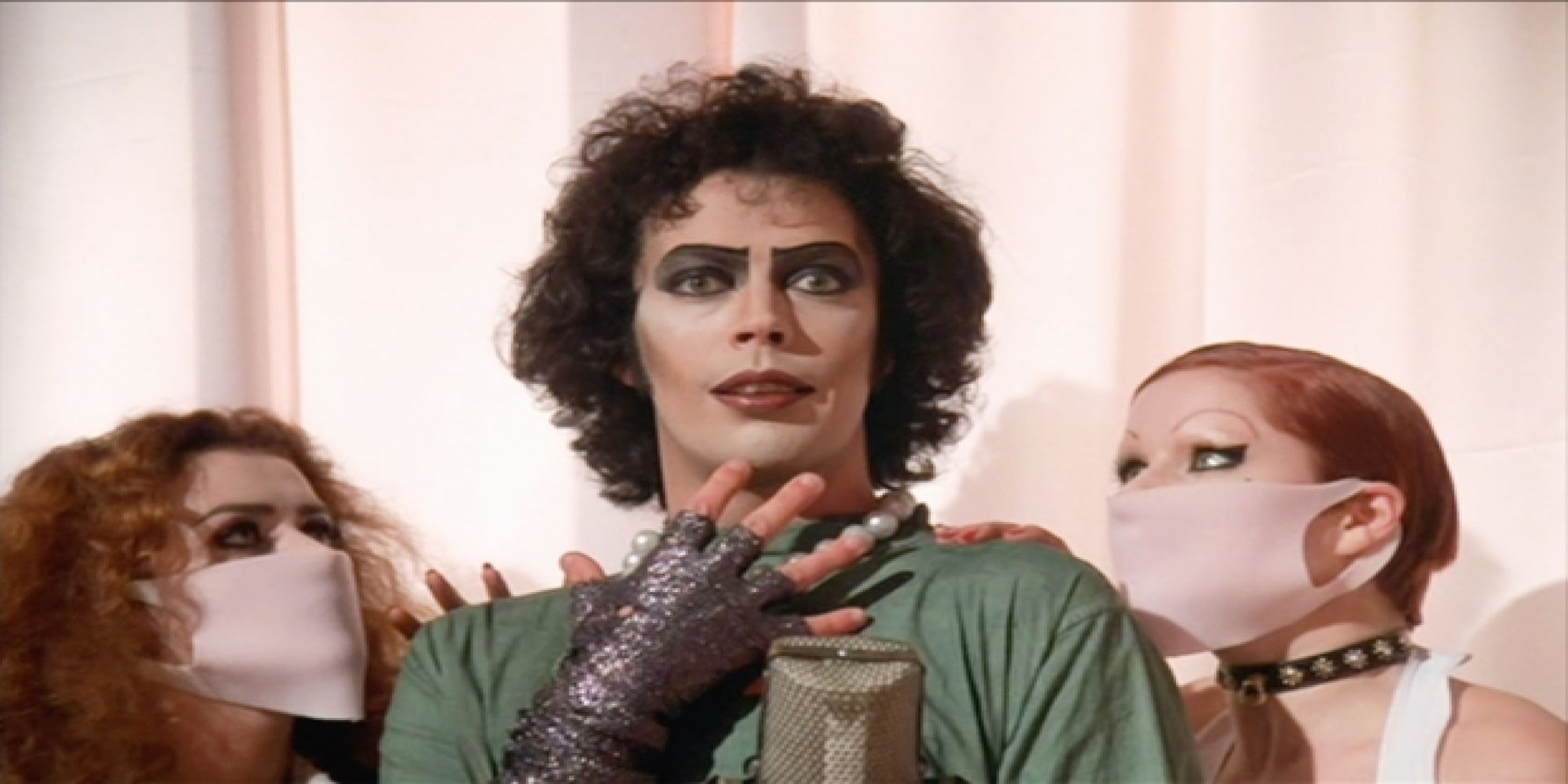 Frank N Furter gushes with Columbia and Magenta about his newest creation in Rocky Horror Picture Show.