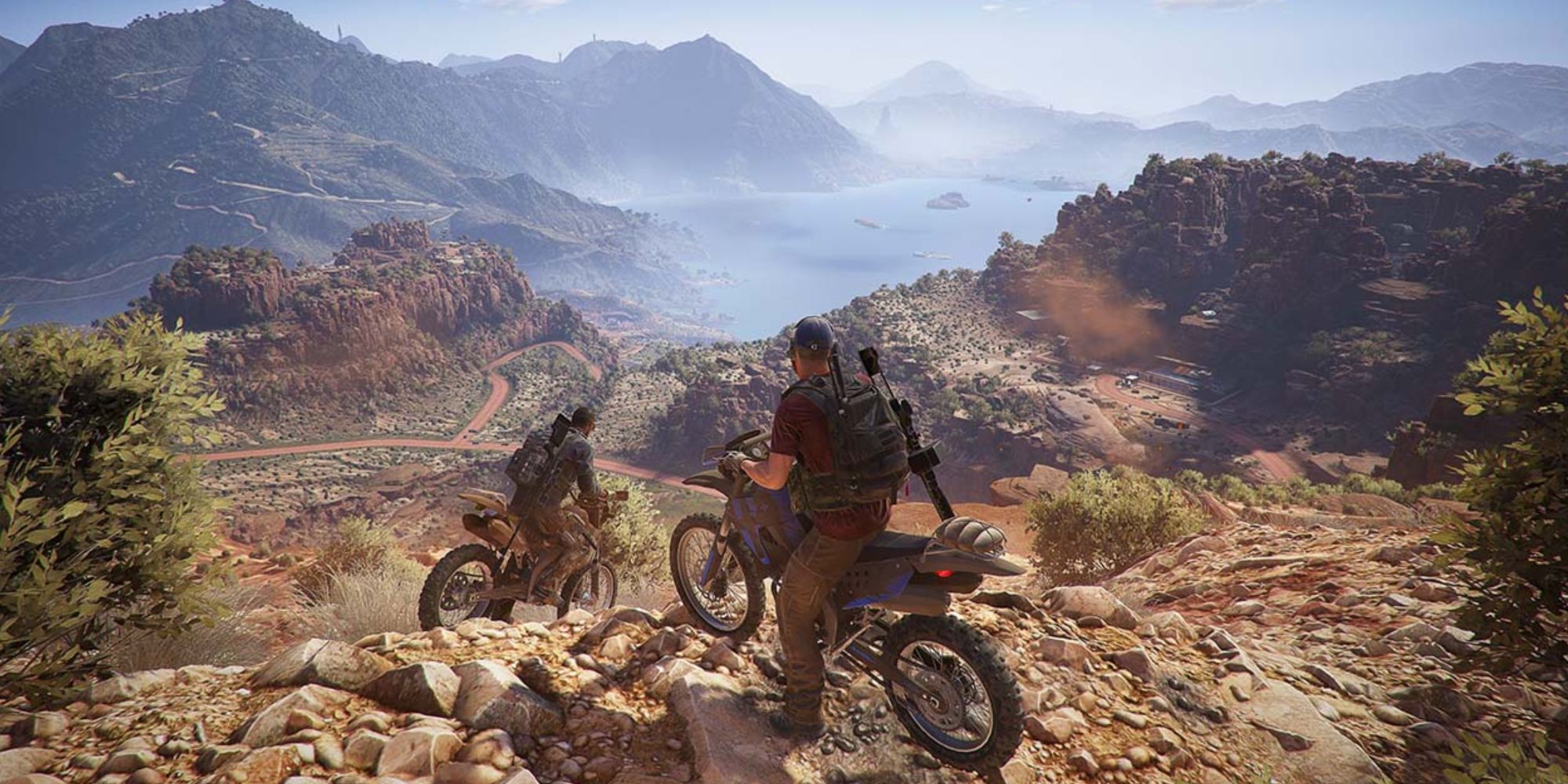 Two squad members on motorbikes overlooking a huge vista in Ghost Recon Wildlands
