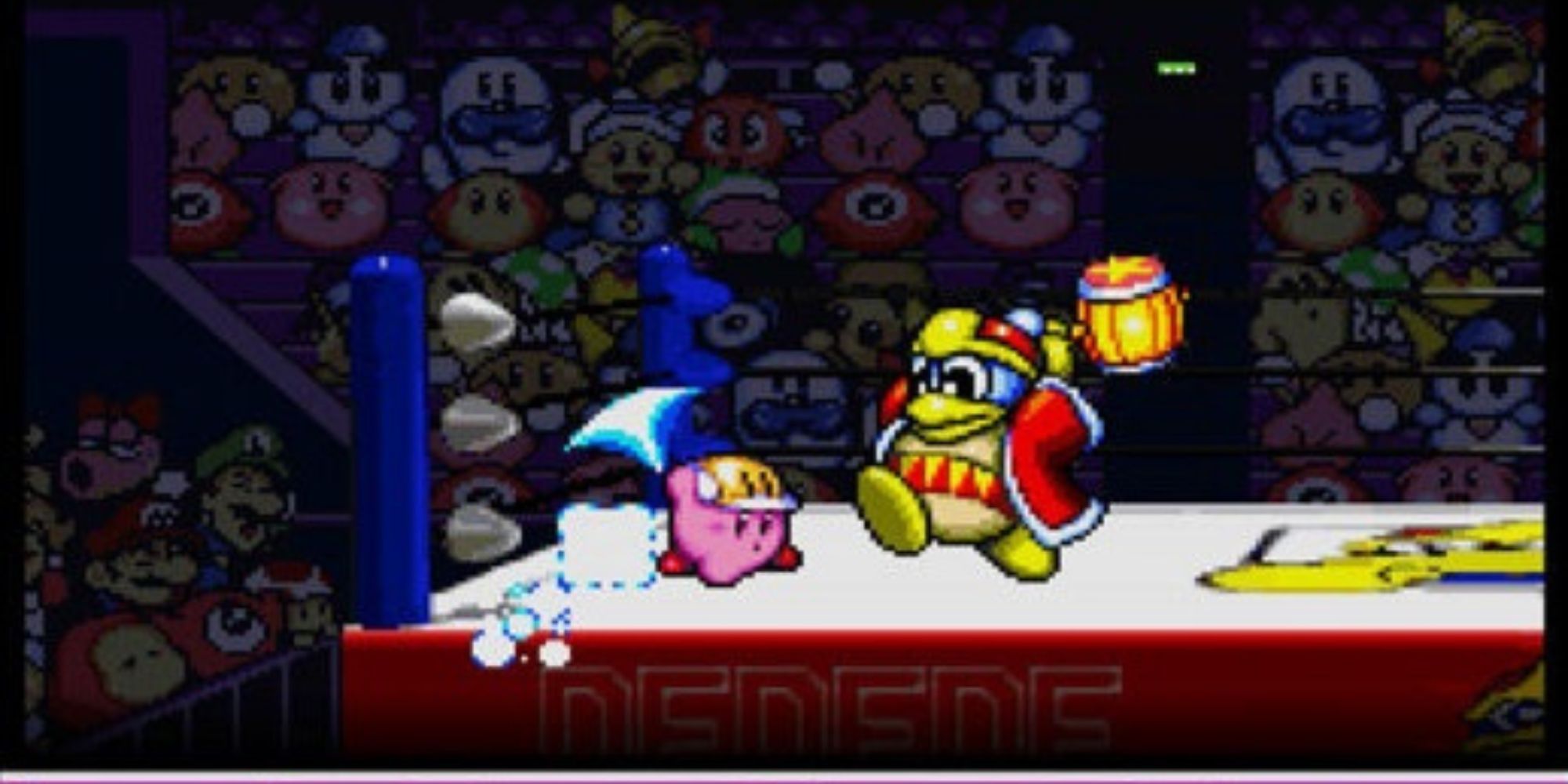 Kirby uses the cutter ability on King Dedede in a ring