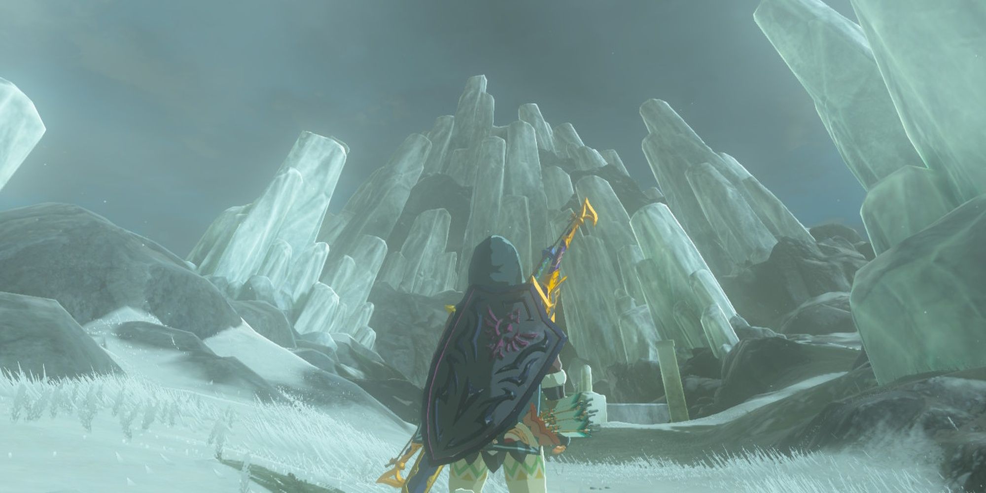 Link standing before a large crystal structure on the top of Mount Lanayru.
