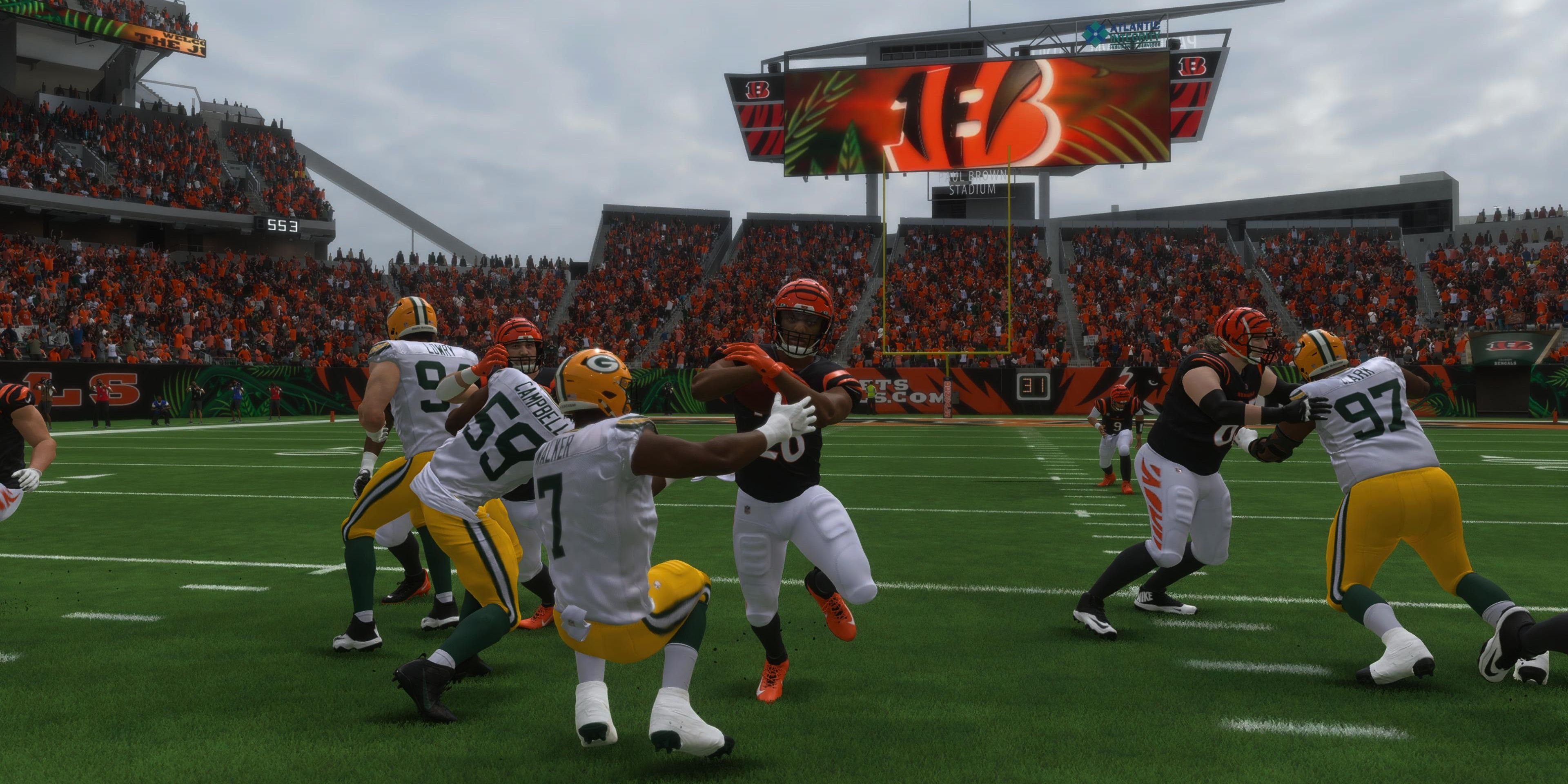 joe mixon running through defender madden 23