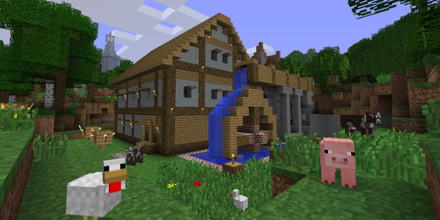 Player-built house with a water feature and animals in Minecraft