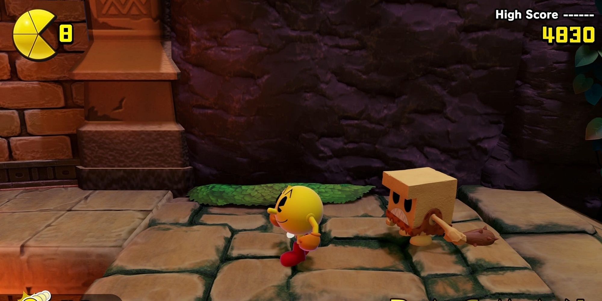 Pac-Man and a minion from the Ruins Area Levels, in Pac-Man World Re-Pac