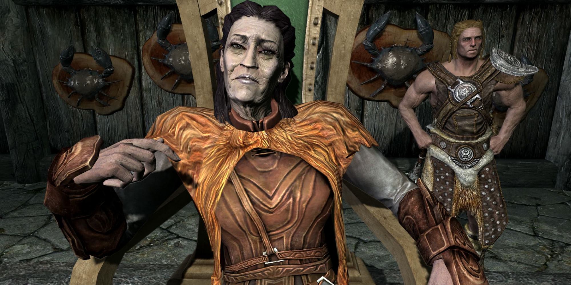 Jarl Idgrod Ravencrone sits in a chair and stares at the camera
