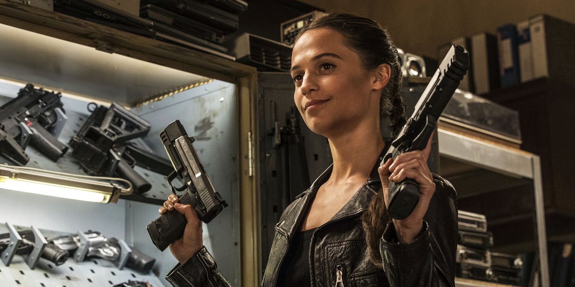 Alicia Vikander sports dual pistols in Tomb Raider 2018