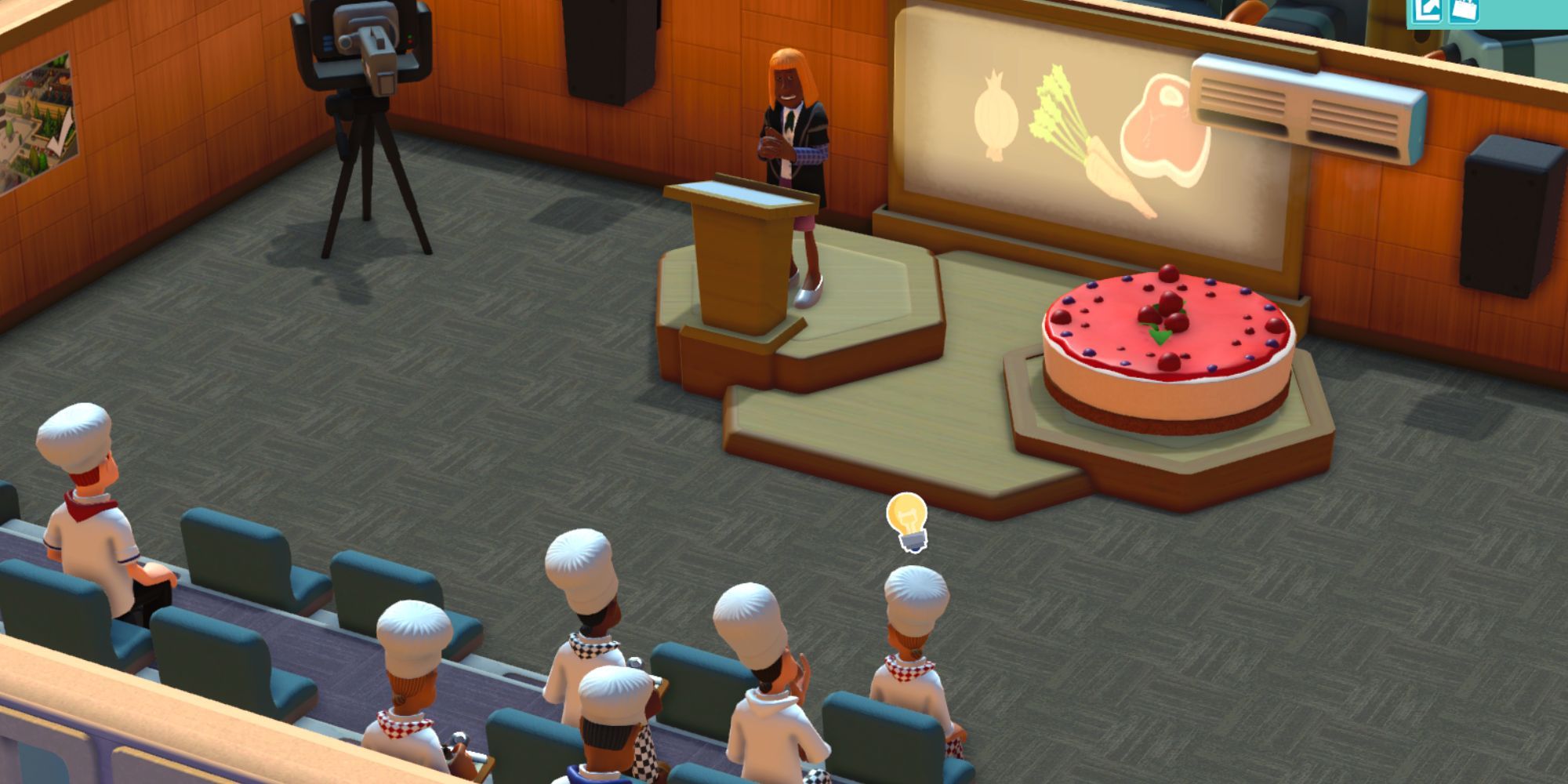 Two Point Campus students attending a lecture for Gastronomy, featuring a floating pink cake.