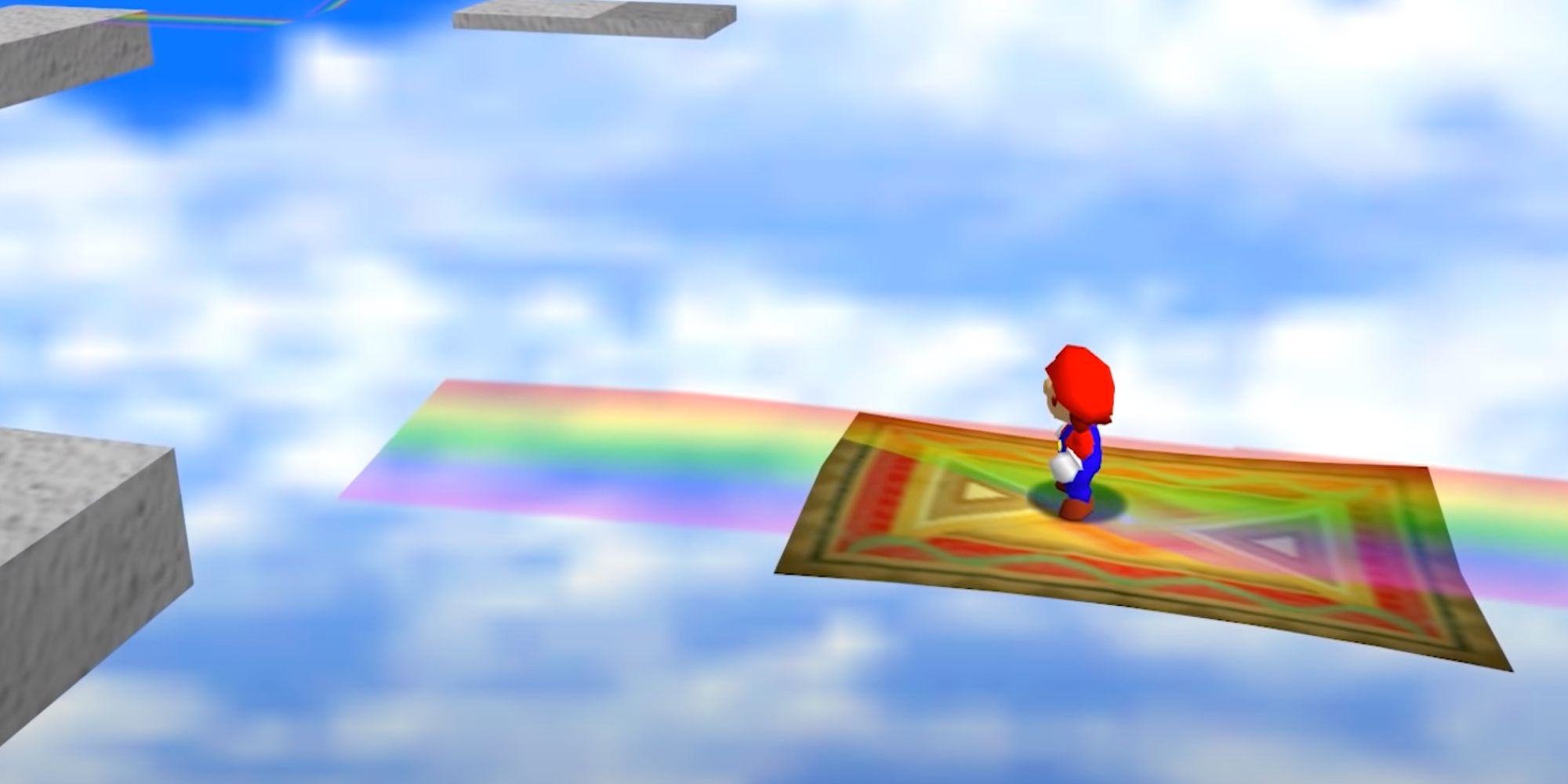 Mario on a flying carpet in Super Mario 64, with a rainbow