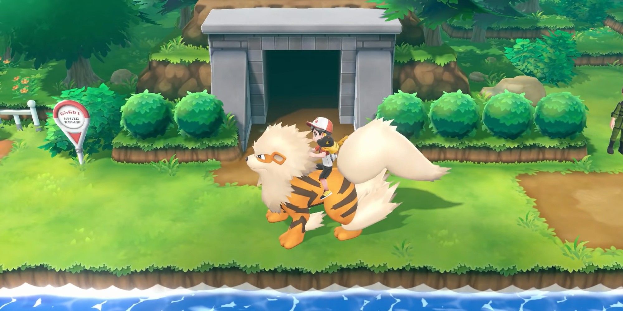 Arcanine from Pokemon Let's Go Eevee & Let's Go Pikachu, standing still in front of Diglett's Cave Entrance