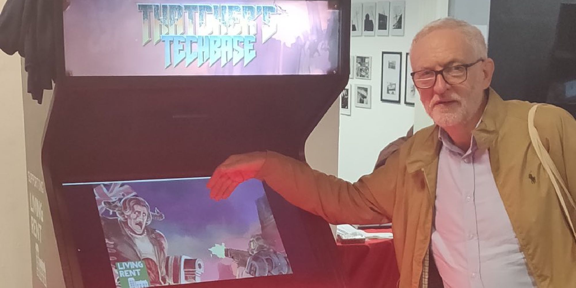 Corbyn posing in front of an arcade machine with Doom mod Thatcher's Techbase