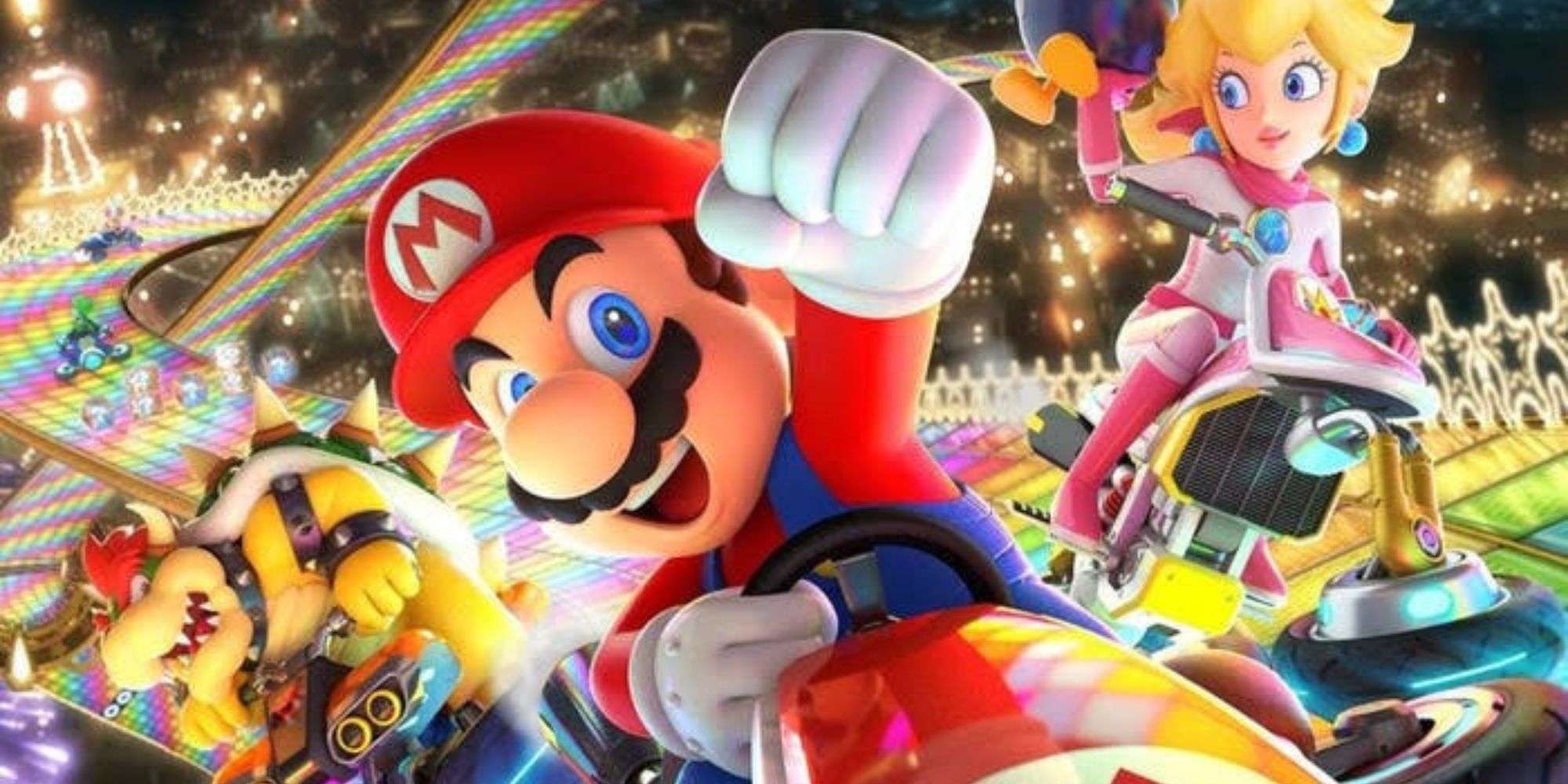 Mario raises his fist on Rainbow Road with Bowser and Princess Peach behind him