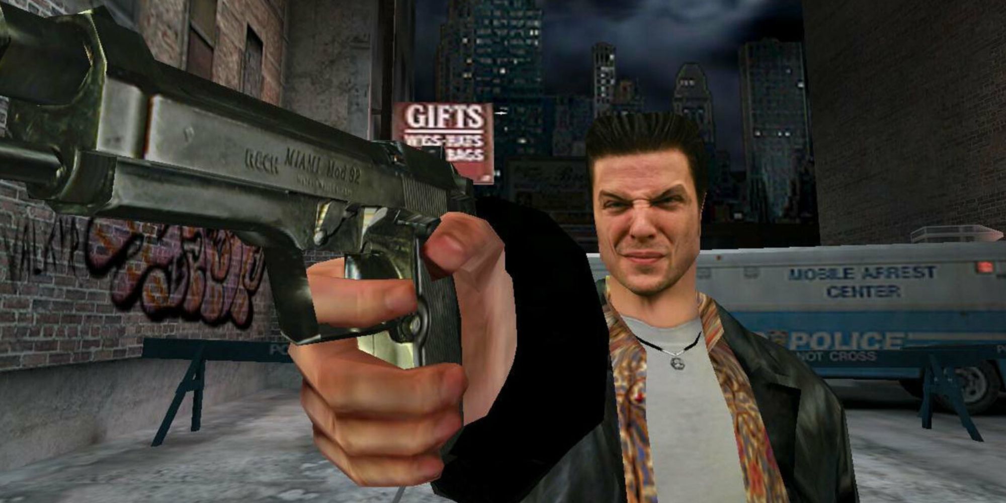 Max Payne holding a pointing a gun in Max Payne
