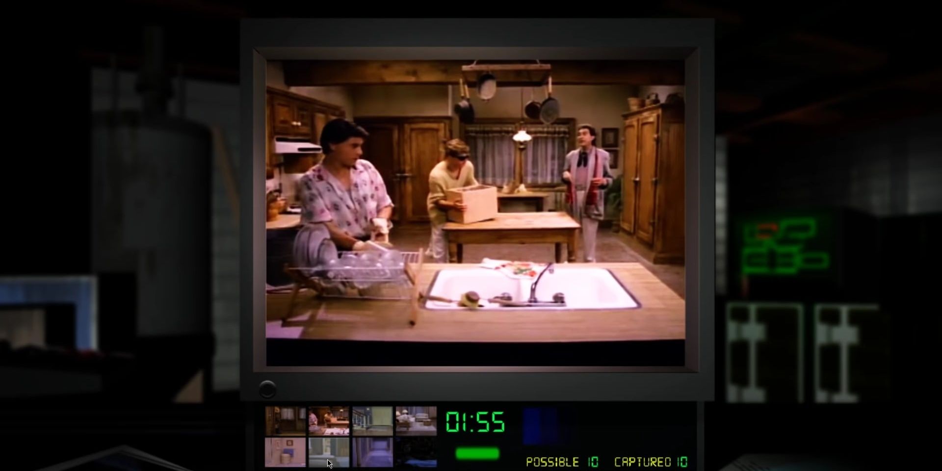 Camera screen of Dad and the boys in the kitchen in Night Trap.