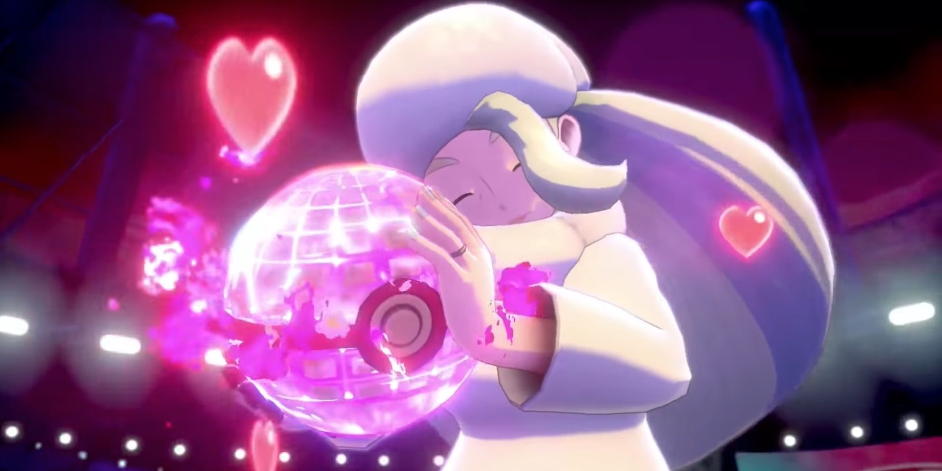 Melony hugging her gigantamax pokeball with love
