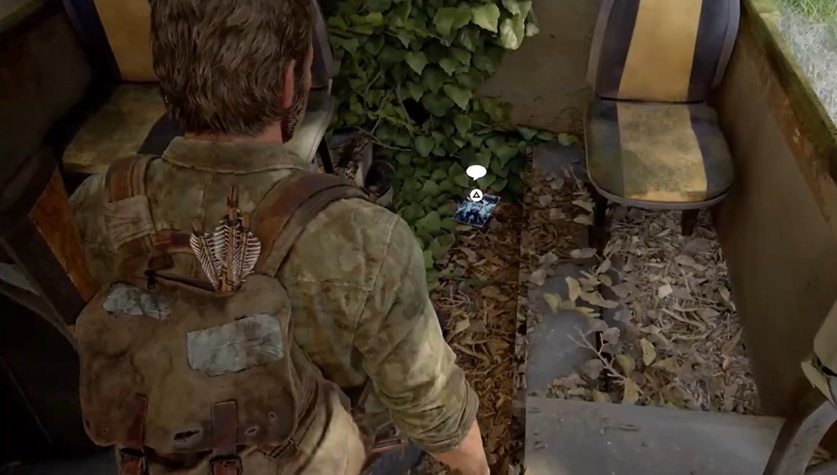 Joel at the back of a bus in The Last of Us Part 1