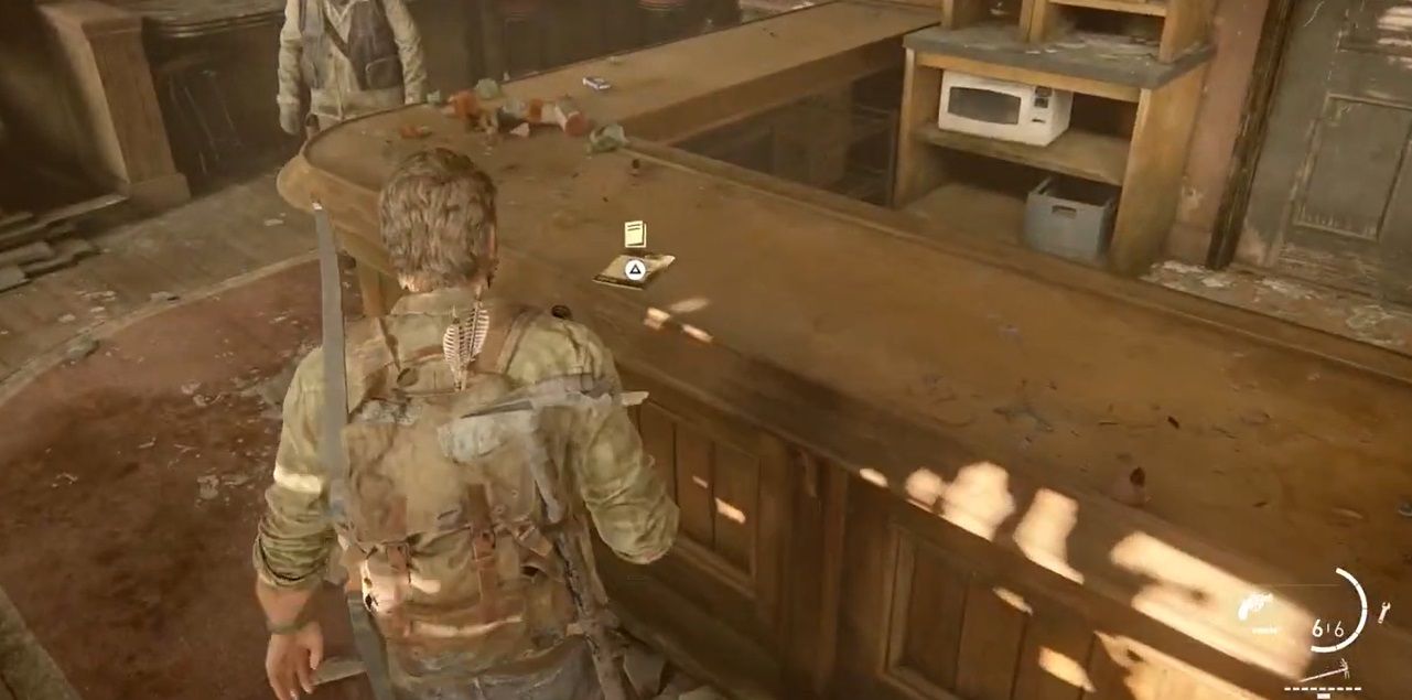 Joel Miller near a countertop in a tavern in Bill Town in The Last of US Part I