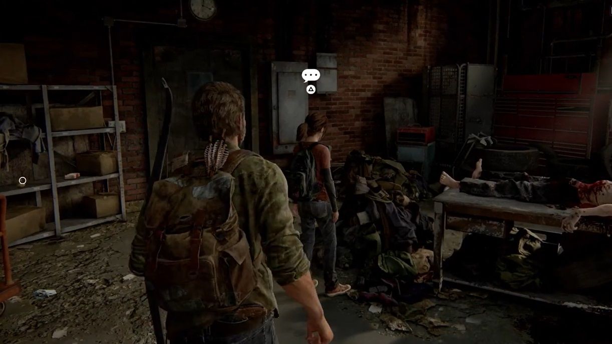 Joel and Ellie stand next to a Deadman on a table inside a garage in The Last of Us Part 1