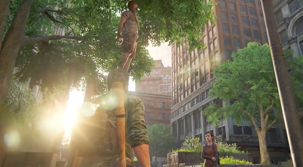 Joel and Ellie look up at a man hanged to a tree in The Last of Us Part 1