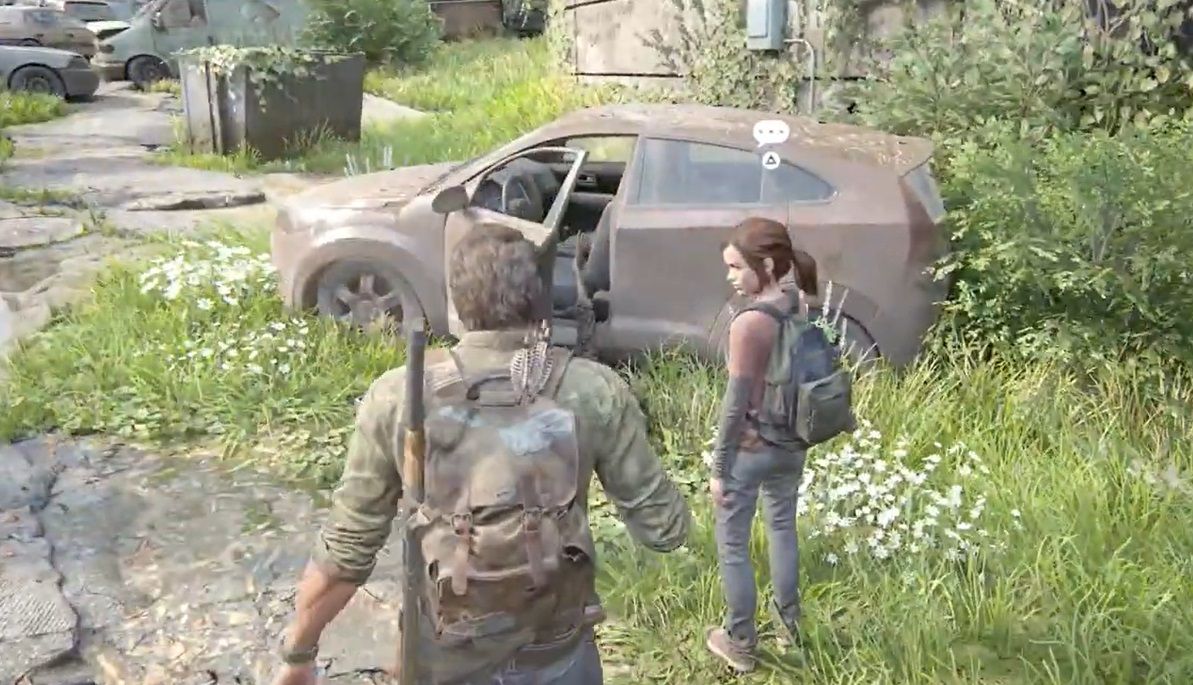  Joel and Ellie stands next to a car on the street in The Last of Us Part 1