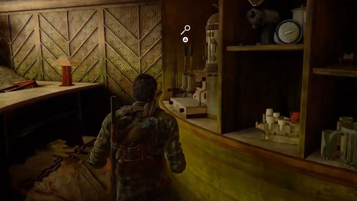 Joel walks toward coffee machine behind a counter in The Last of Us Part 1