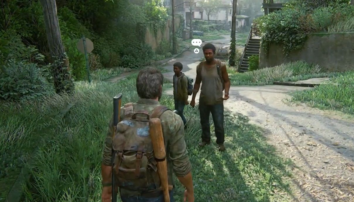 Henry talks to Joel on the suburbs street in The Last of Us Part 1 Joel