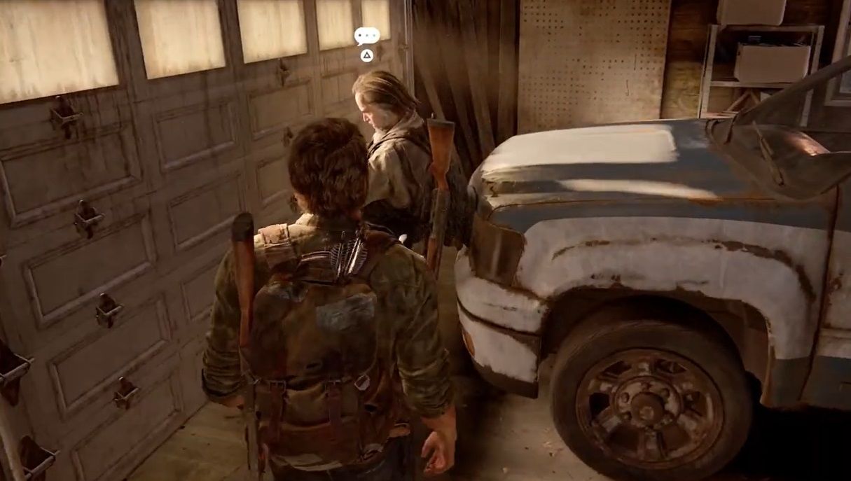 Joel walks up to Bill who rest on the bonnet of a pickup in The Last of Us Part 1