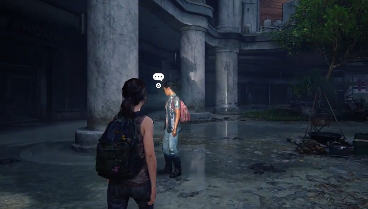Ellie and Riley stands in front of a pillar in The Last of Us Part 1 Left Behind