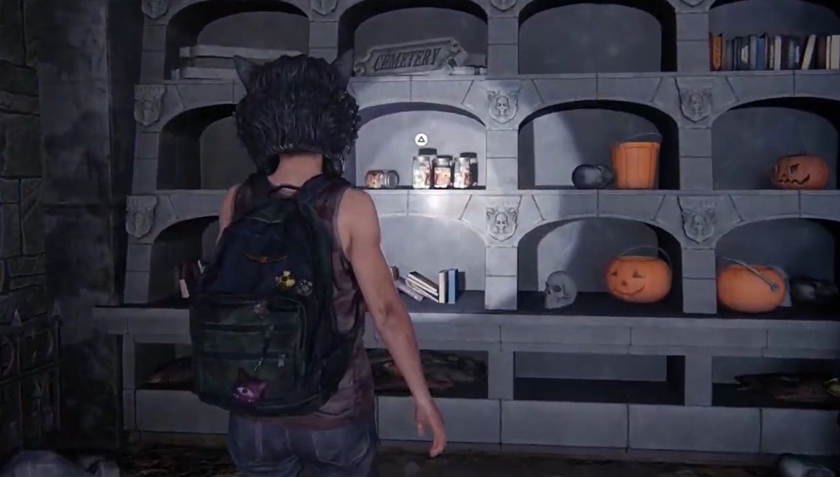 Ellie stands in front of a shelf filled with jars and pumpkins heads in The Last of Us Part 1 Left Behind