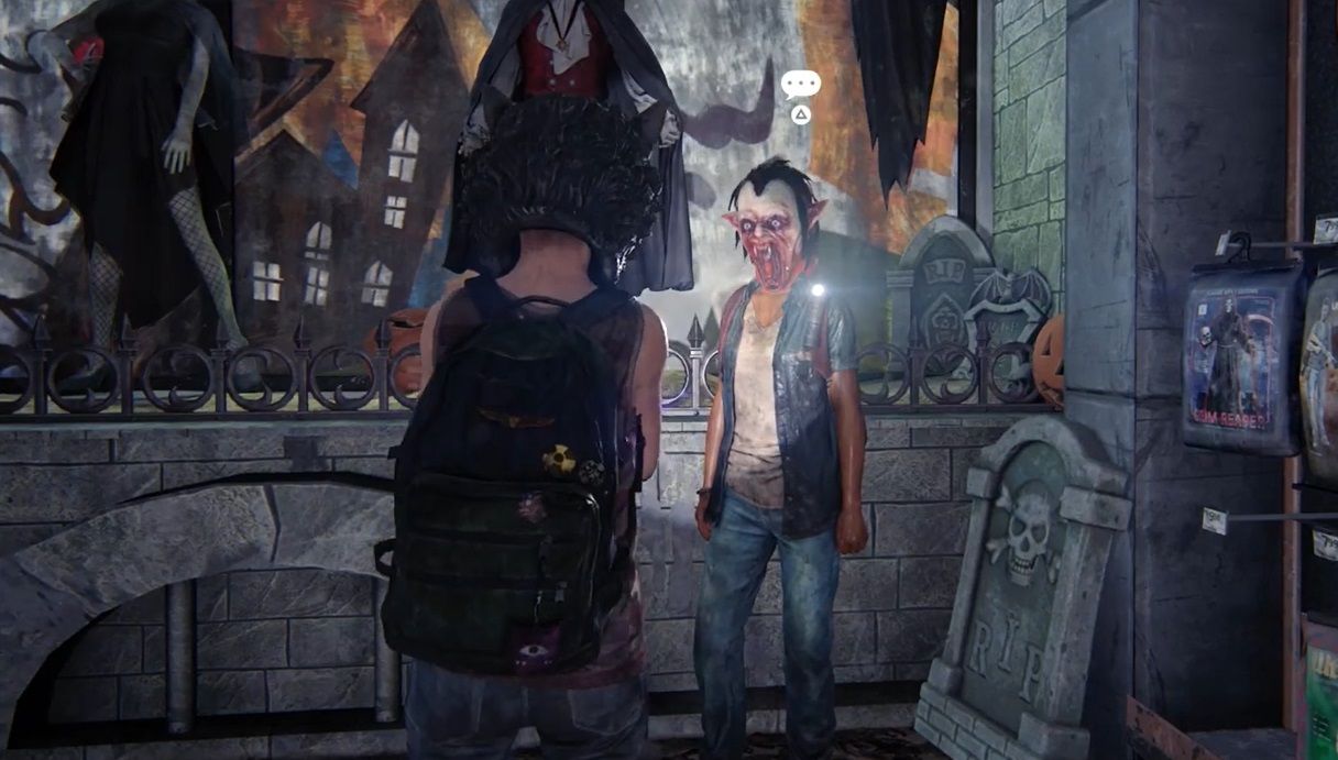 Riley looks at Ellie with a bloody mask on inside a Halloween store in The Last of Us Part 1 Left Behind
