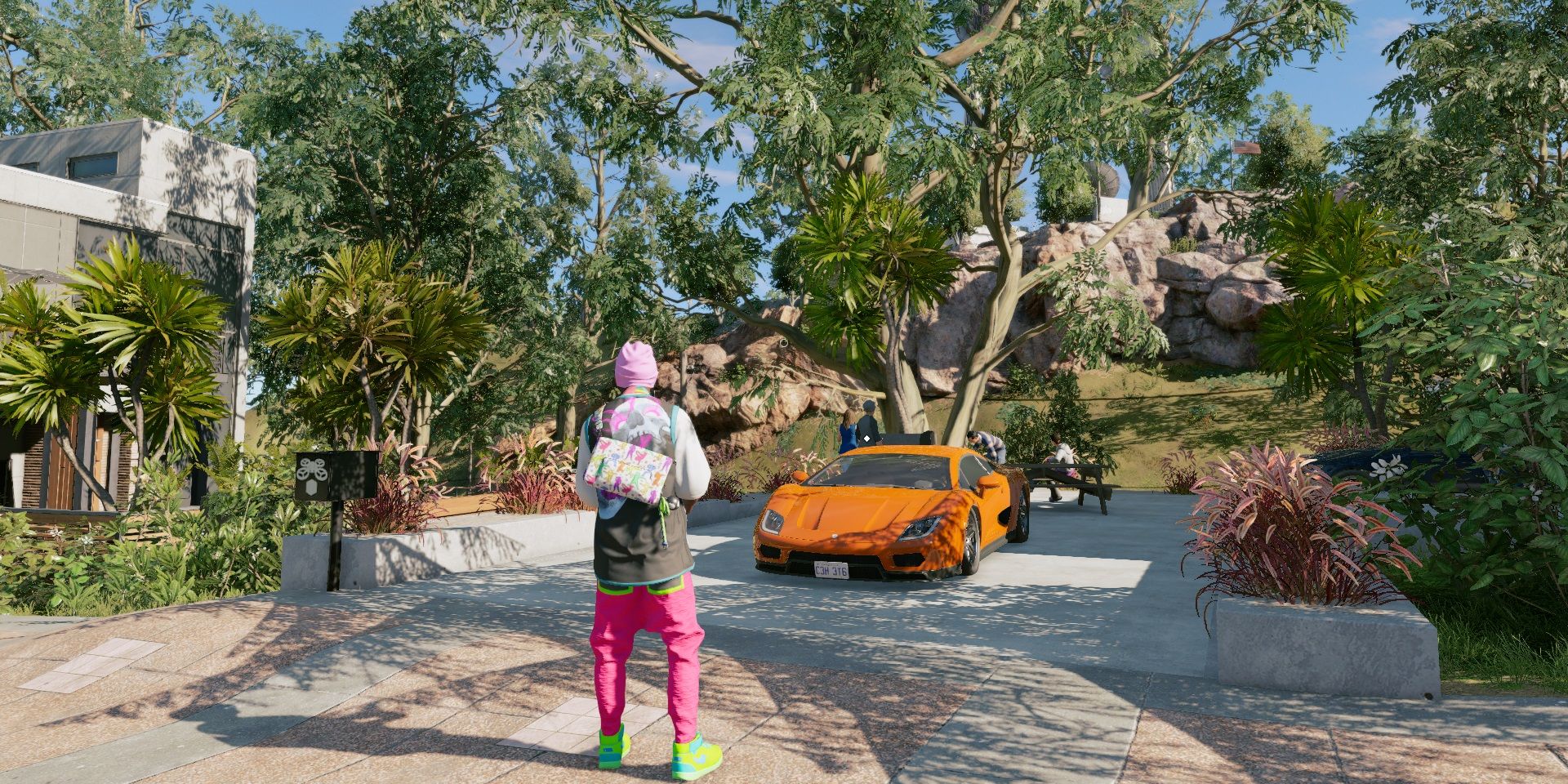 Watch Dogs 2 protagonist in pink outfit looking at a sports car with lots of trees in the background