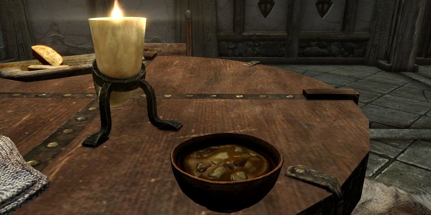 Skyrim screenshot of a bowl of venison stew on a table.