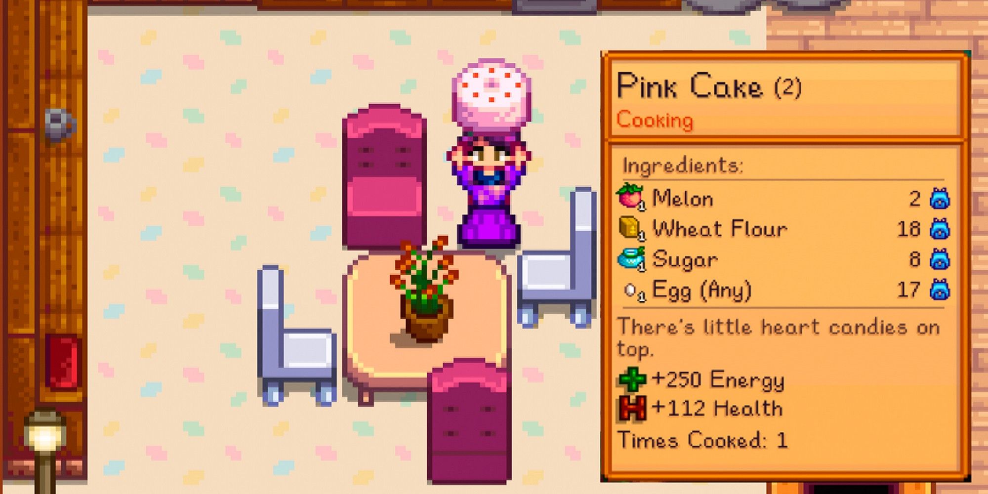 stardew valley farmer in her kitchen with a pink cake
