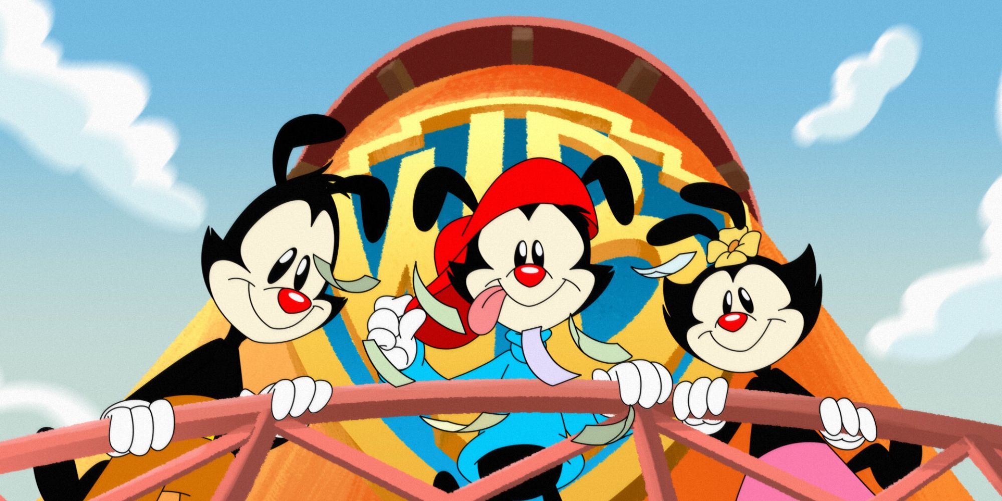 The main three Animaniacs - Yakko, Wakko, and Dot standing in front of the Warner Bros. Water Tower.