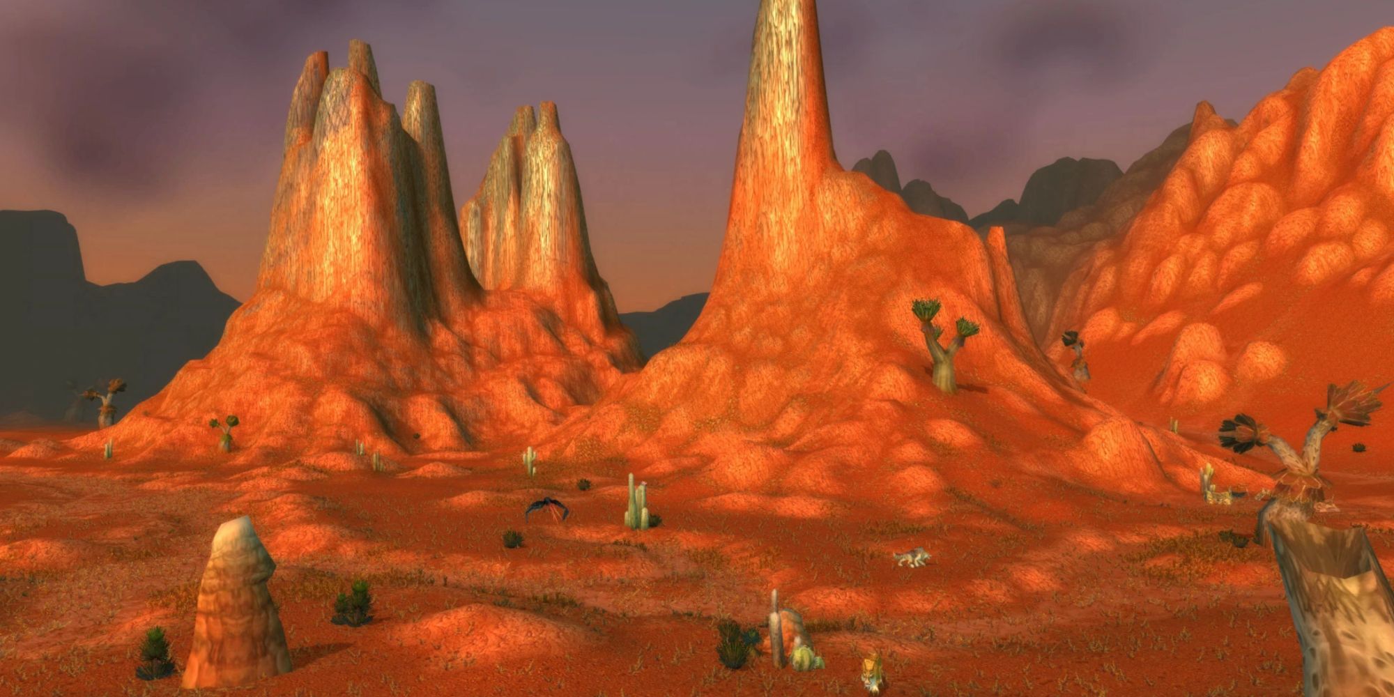 Badlands landscape with road and red cliffs from Classic World of Warcraft.