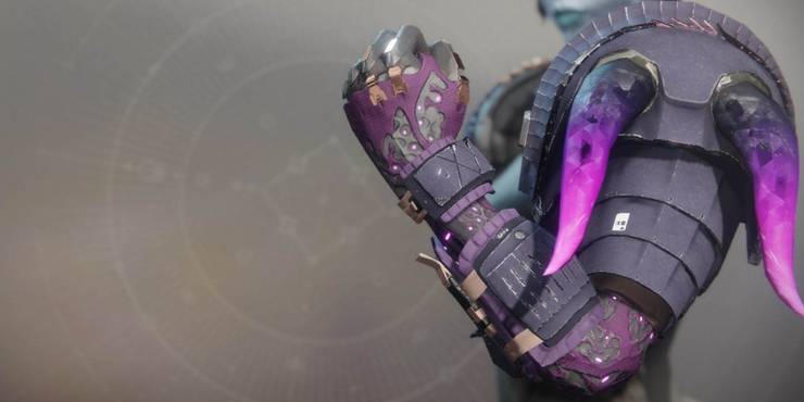 Doom Fang Pauldron gleams with void energy in Destiny 2.