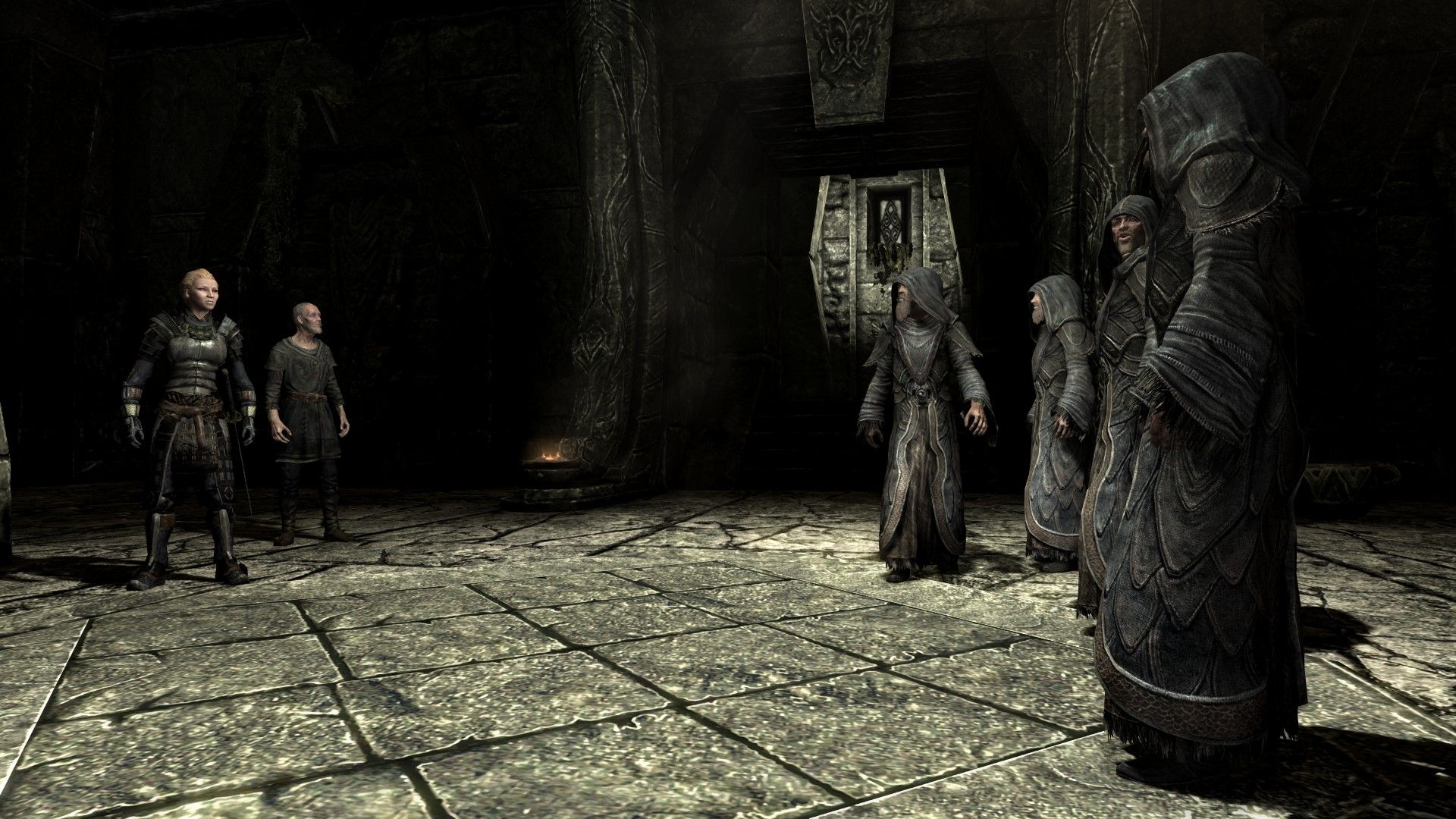 An armored woman and an old man confront monks in a stone monastery