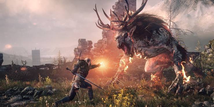 Geralt attacking a horned enemy with magic in The Witcher 3 Wild Hunt.jpg?q=50&fit=crop&w=740&dpr=1