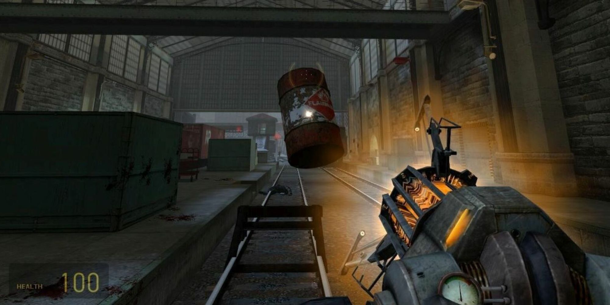 Gravity Gun picking up a red barrel in Half-Life 2