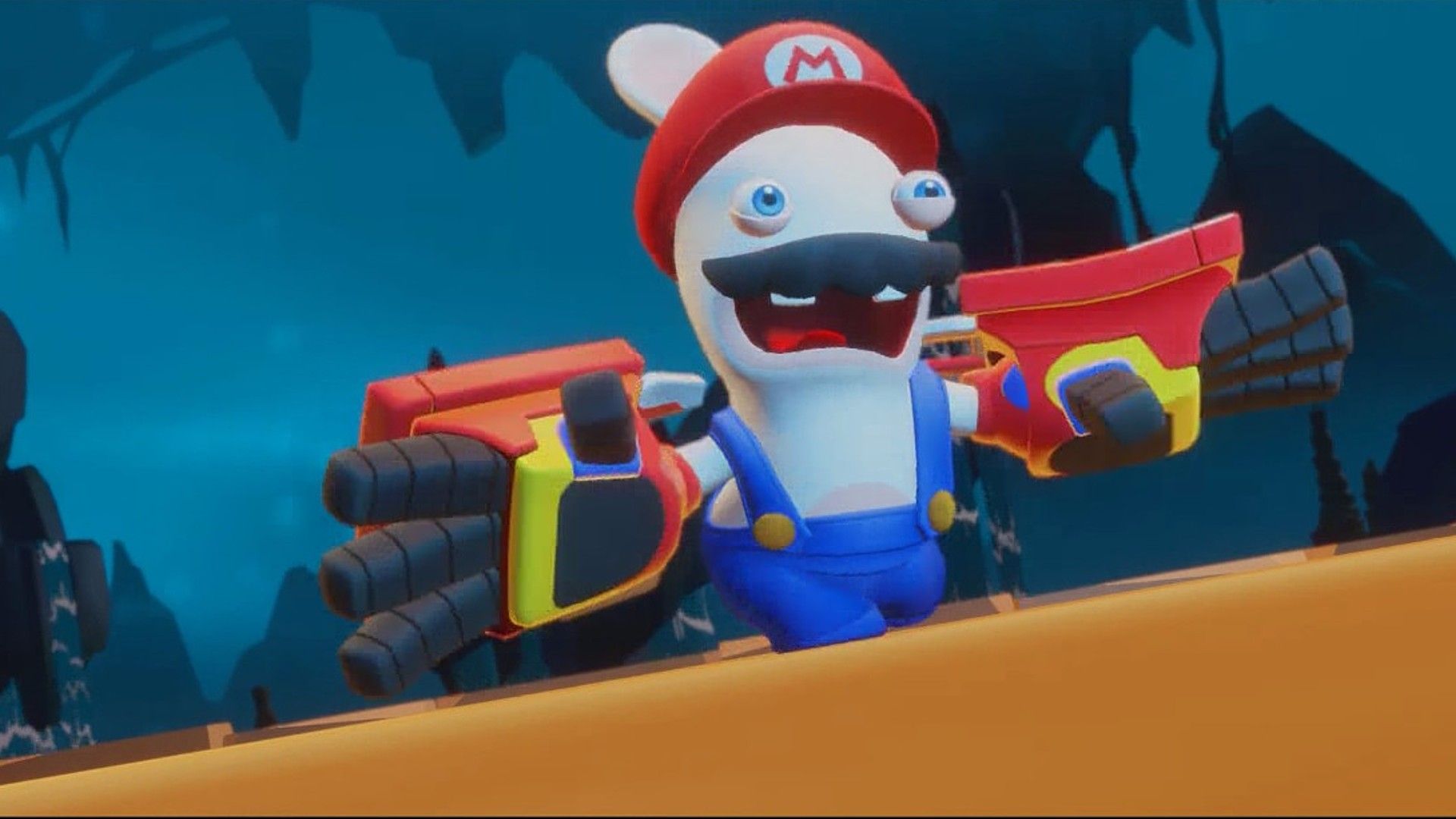 Rabbid Mario poses with The Dukes (his weapons) in the Sunrise Temple of Beacon Beach in Mario + Rabbids Sparks Of Hope