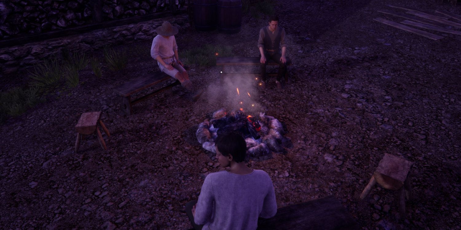 Three men sitting on wooden benches around a communal firepit