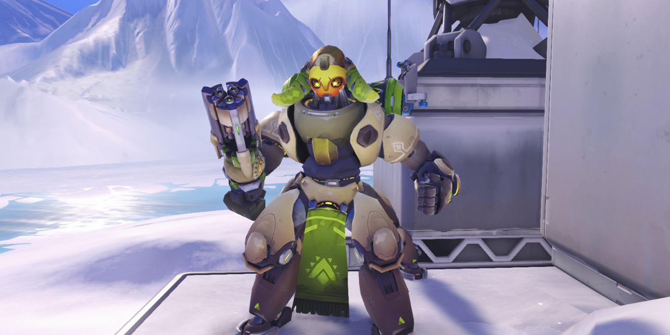 Overwatch 2 Orisa Emote Holding Her Gun Near Snow