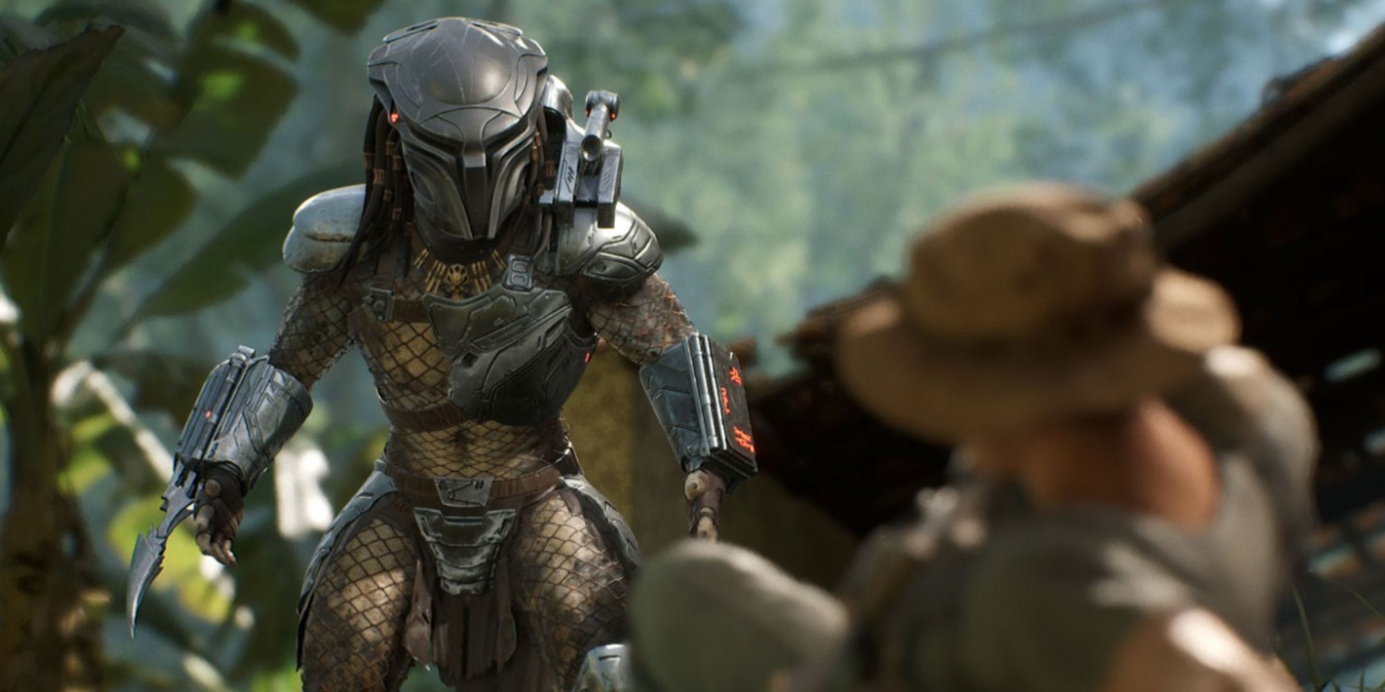 Predator standing over a fallen soldier in Predator: Hunting Grounds