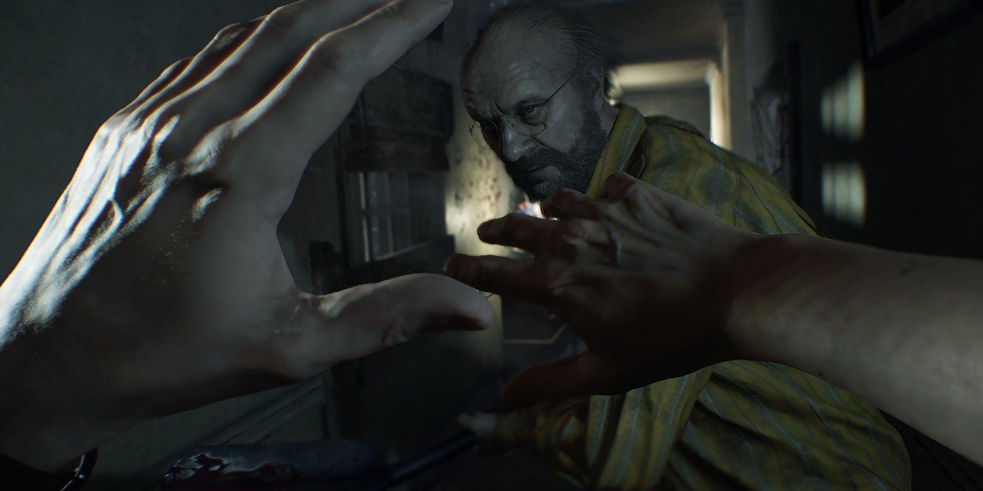 Ethan being attacked by Jack in Resident Evil 7