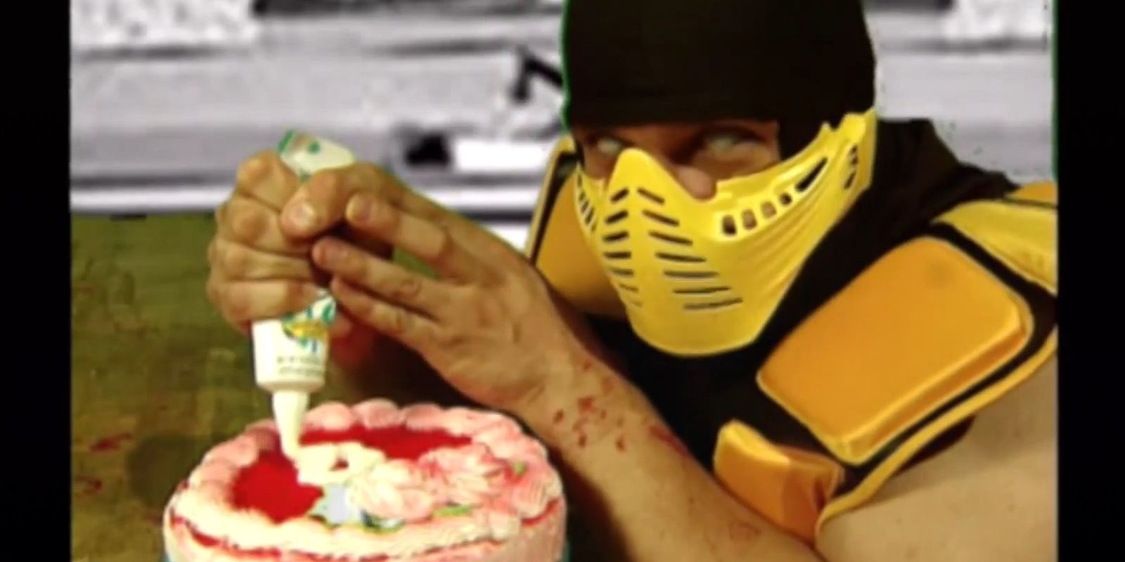 Scorpion icing a cake from Cooking With Scorpion in Mortal Kombat: Deadly Alliance.