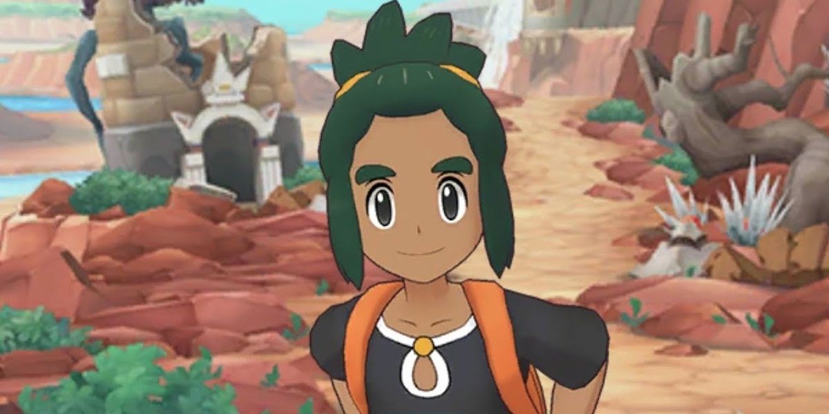 Hau smiling on a path in Pokemon Masters
