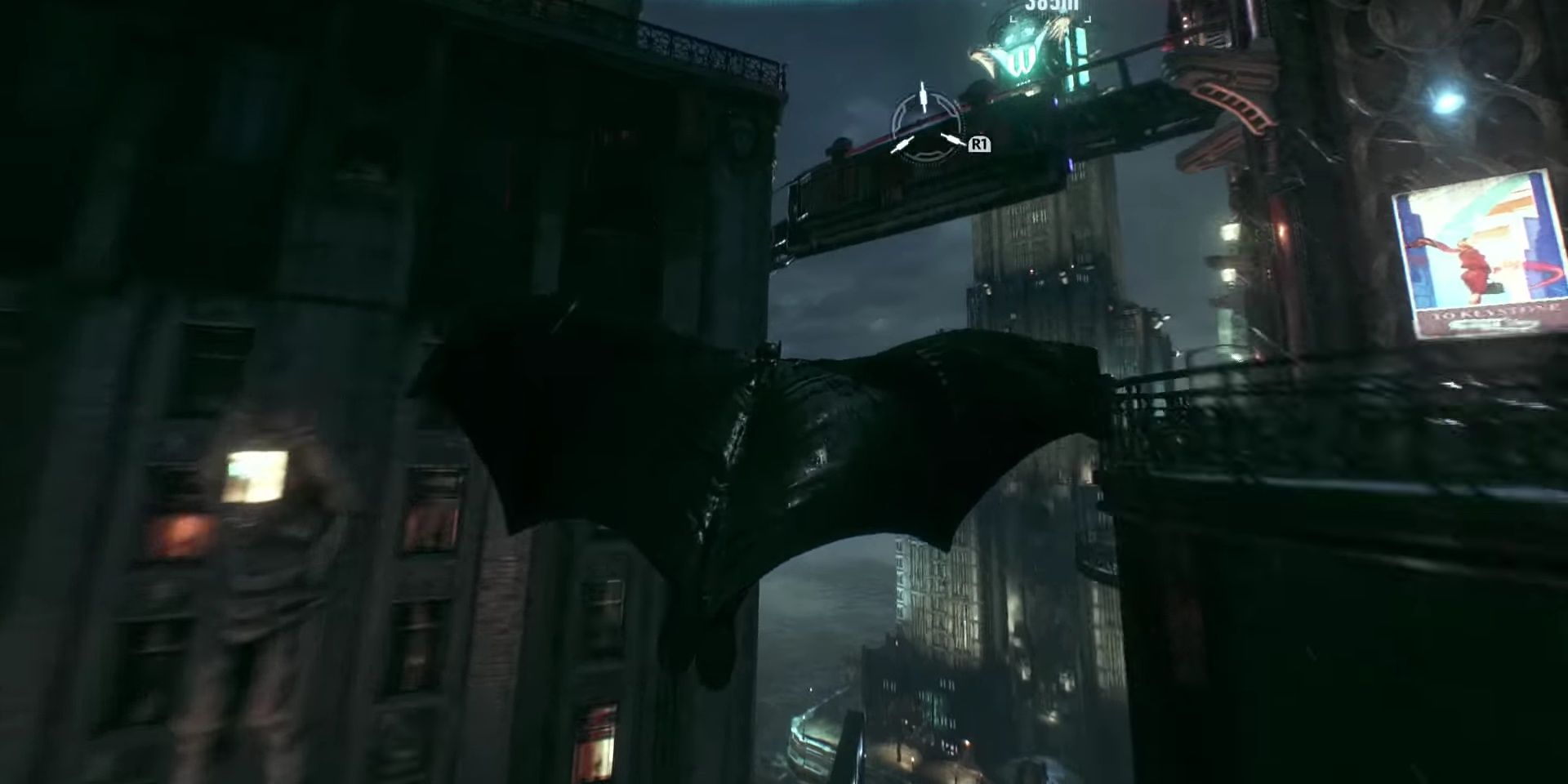 Screenshot of a player moving towards the Wayne Tower building in Arkham Knight.