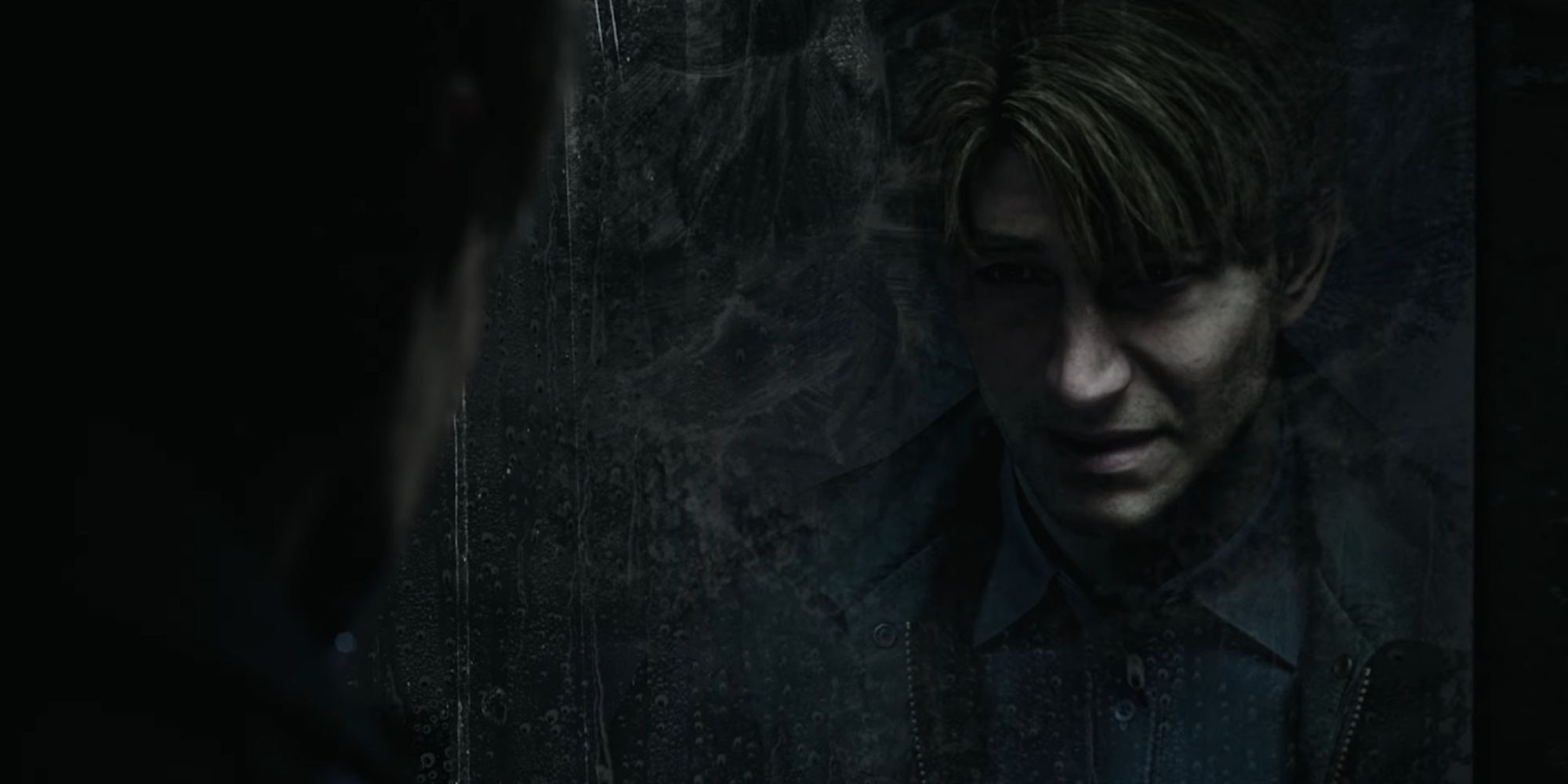James looking at the mirror in the Silent Hill 2 Remake.
