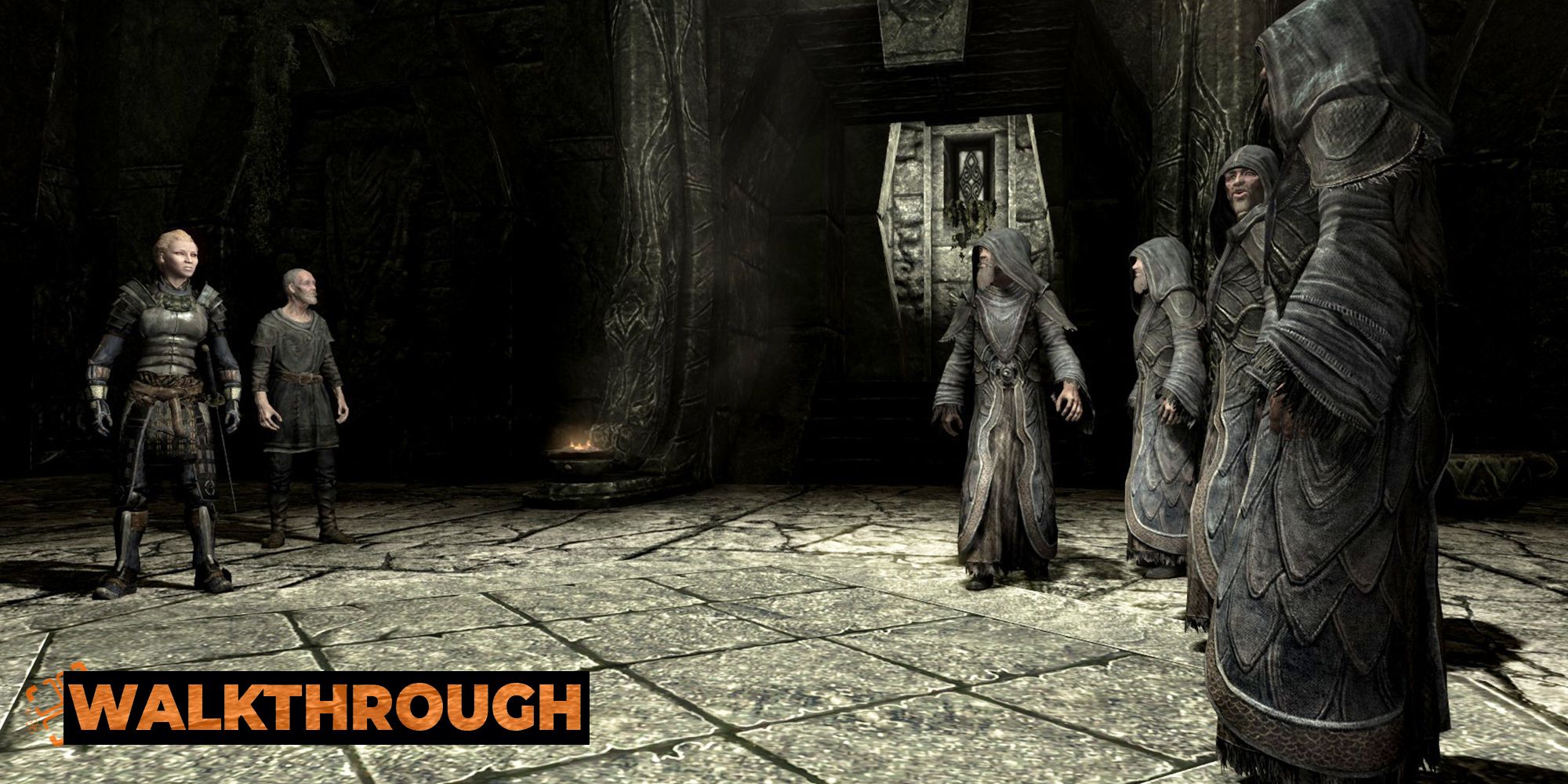 Two people confront a group of hooded monks in a stone monastery 
